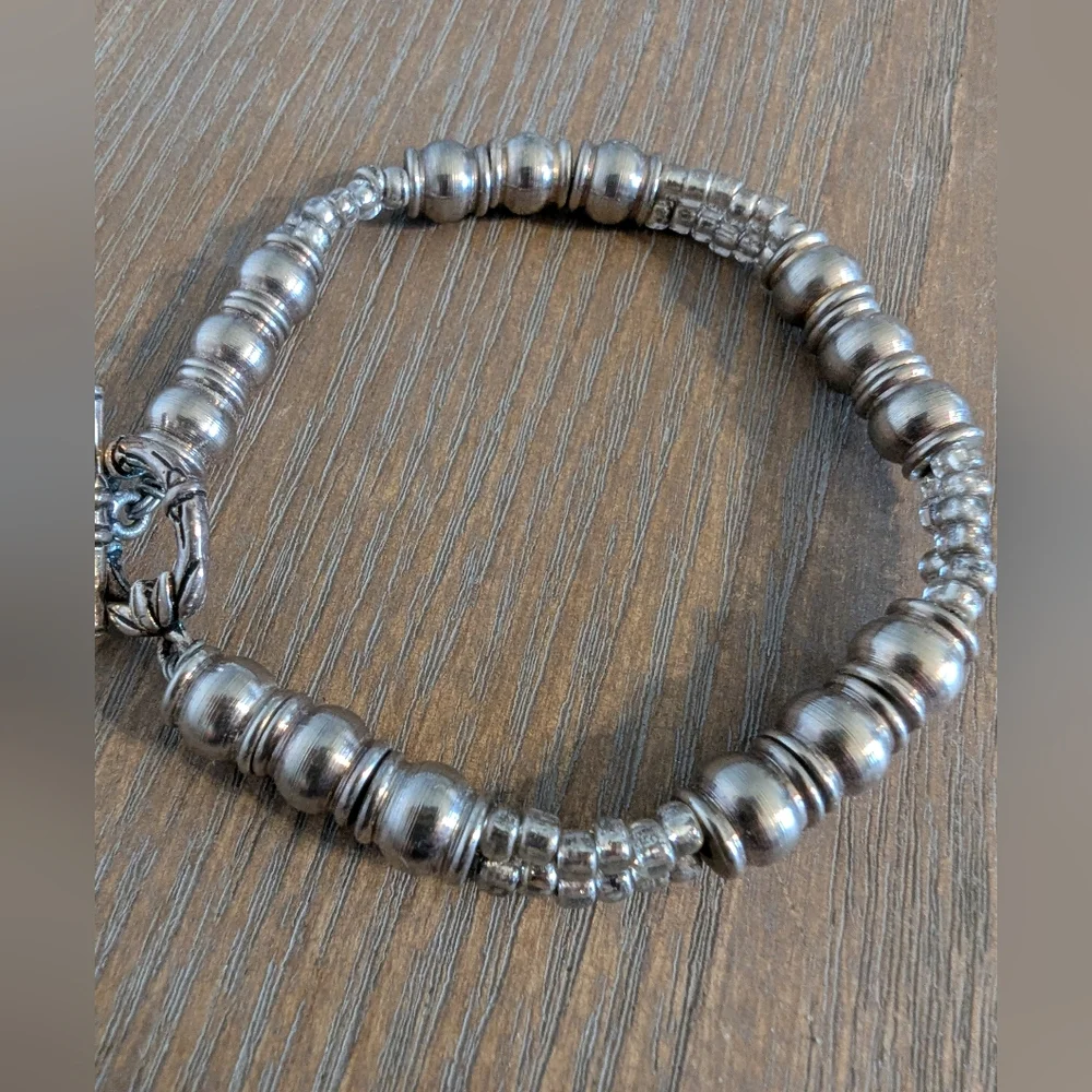 Source Unknown elegant silver